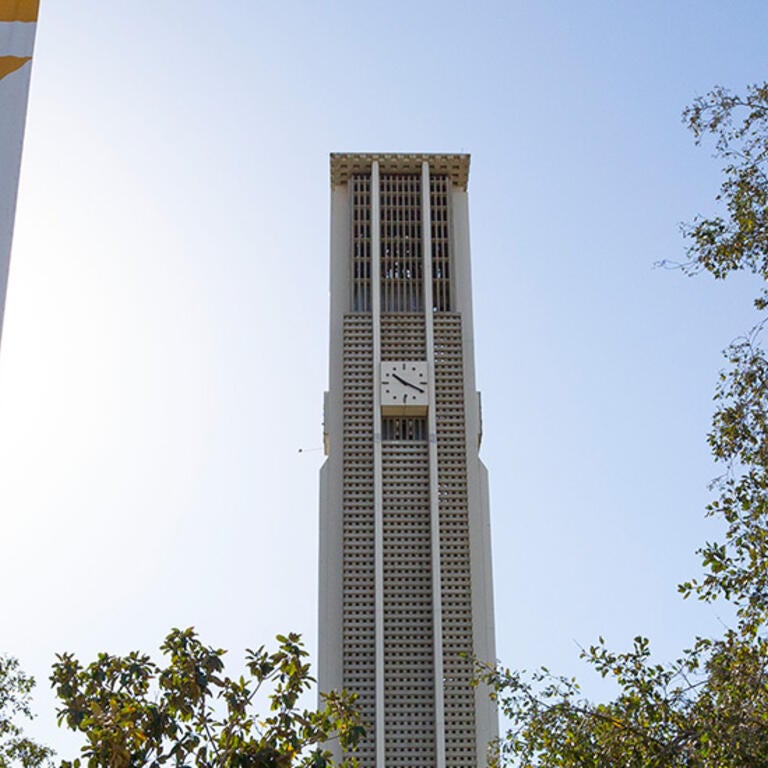 UC Riverside banner with bell tower in the background